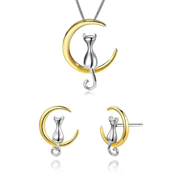 Earrings Gold Shield Juego de aretes y collar de plata con dije de gato y Bao en Oro 18K Earrings Gold Shield Juego de aretes y collar de plata con dije de gato y Bao en Oro 18K