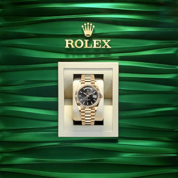 Rolex Bracelets Rolex Day Date 40mm Ref 228238 Black Stick Dial Fluted Bezel 18K Yellow Gold President Bracelet Mens Watch