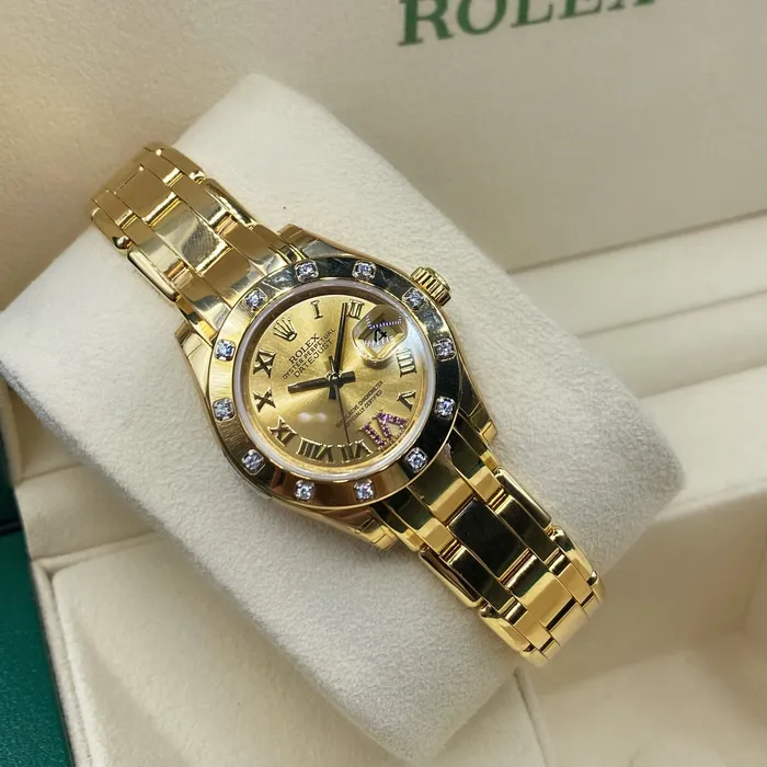 Rolex Pearlmaster 29mm Ref 803180163 Champagne Roman Diamond Dial Diamond Bezel 18K Yellow Gold Bracelet Womens Watch Rolex Bracelets