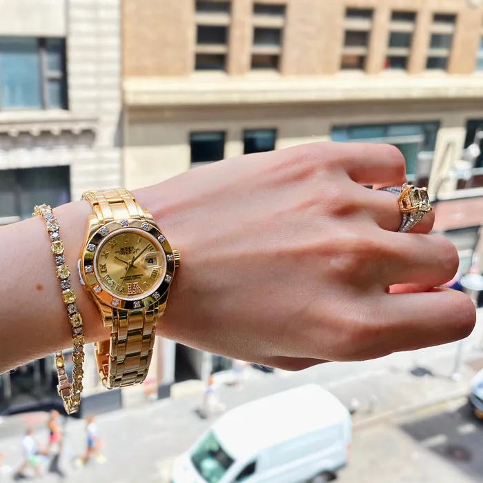 Rolex Pearlmaster 29mm Ref 803180163 Champagne Roman Diamond Dial Diamond Bezel 18K Yellow Gold Bracelet Womens Watch Rolex Bracelets