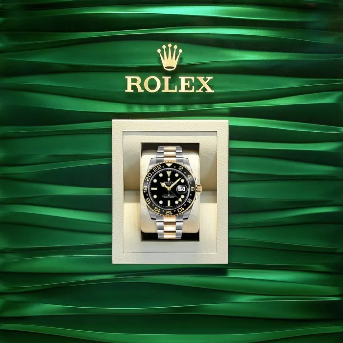 Rolex Rolex GMTMaster II 40mm Ref 116713LN Black Dial Black Bezel Two Tone Stainless Steel 18K Yellow Gold Oyster Bracelet Mens Watch Bracelets